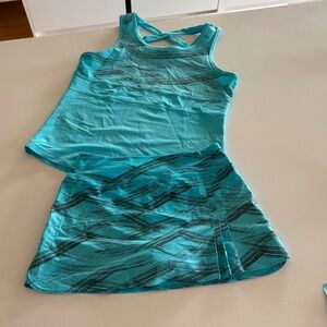 Tennis kit ( skirt and cami). 15$ for both size S